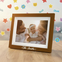 Picrora light oak digital photo frame personalized with a custom The Smiths UV transfer decal on the bottom bezel.